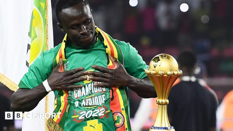 Afcon 2025: Will final be Sadio Mane’s last dance with Senegal? Sadio Mane holds his hands to his chest as he admires the Africa Cup of Nations trophy, which stands on a plinth