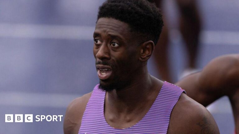 Enhanced Games sprinter Reece Prescod ‘not taking drugs’ for Las Vegas event Close-up photograph of Reece Prescod following a 100m race. He has black hair and a goatee beard, and is wearing a purple running vest. Part of the track can be seen in the background.