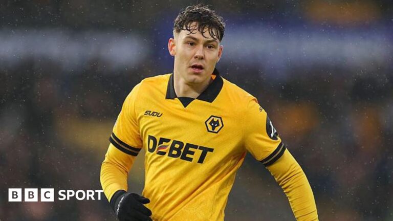 Jorgen Strand Larsen: Crystal Palace agree deal in principle for Wolves striker Jorgen Strand Larsen wearing a gold Wolves shirt