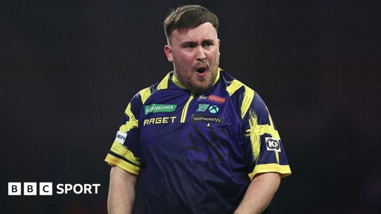 Luke Littler celebrates