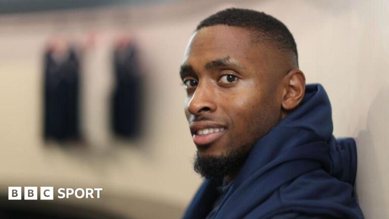 Joel Fearon: From pizza delivery man to Winter Olympic hopeful Joel Fearon smiles while wearing his training kit