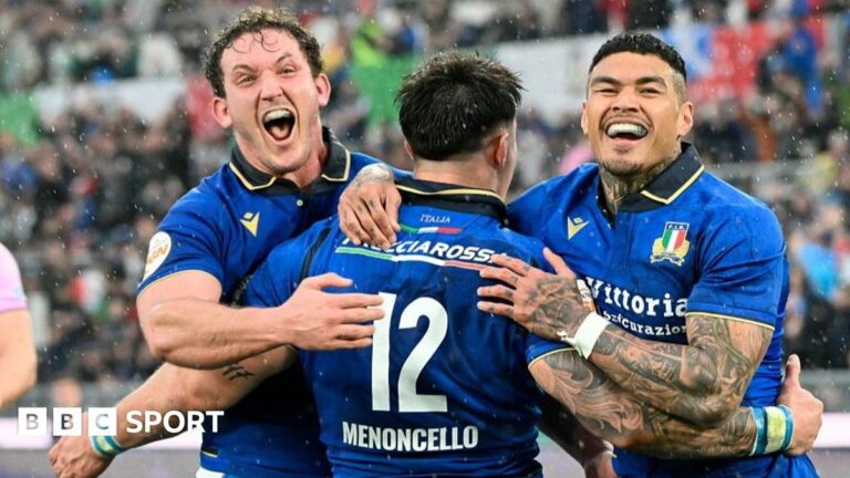 Six Nations: Italy punish lacklustre Scotland in Rome rain Louis Lynagh (left) and Scotland's full-back Tom Jordan challenge for the ball