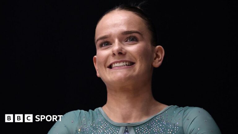 Alice Kinsella makes GB gymnastics history – returning to elite competition after giving birth British gymnast Alice Kinsella smiling
