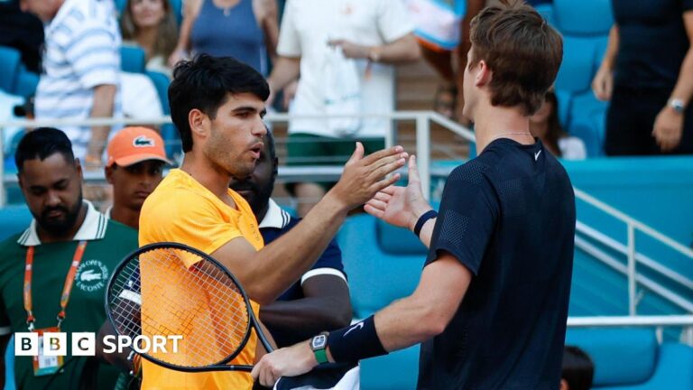 Miami Open: World number one Carlos Alcaraz suffers surprise defeat to American Sebastian Korda in third round Sebastian Korda and Carlos Alcaraz embrace at the end of their match at the Miami Open