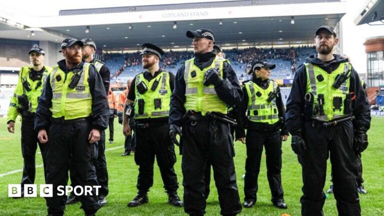 Rangers ‘unequivocally condemn’ Old Firm fan disorder as SFA launch independent review Police officers on the pitch at Ibrox