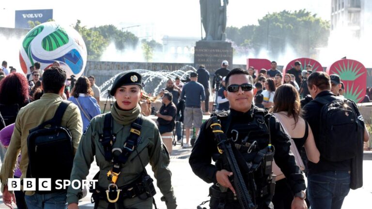 World Cup 2026: Co-hosts Mexico plan to deploy 100,000 security personnel Two police officers guard the area after in front of a giant football installed as part of the 100 days leading up to the 2026 Fifa World Cup, in Guadalajara