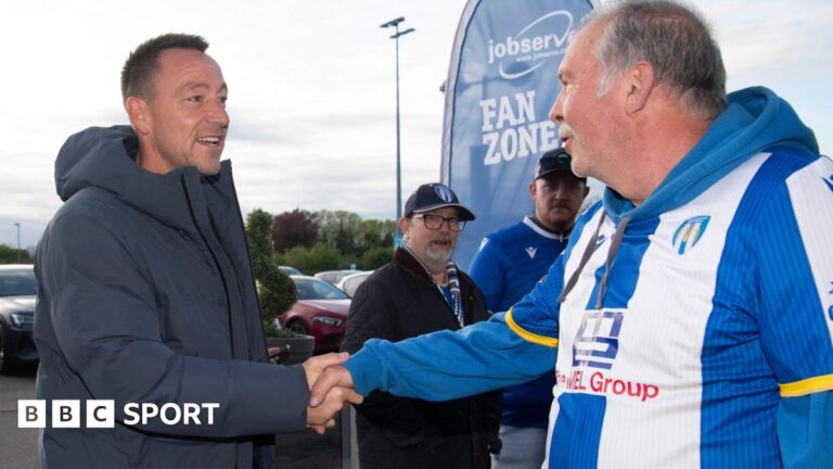 John Terry attends Colchester United game after takeover report John Terry shakes the hand of a Colchester fan