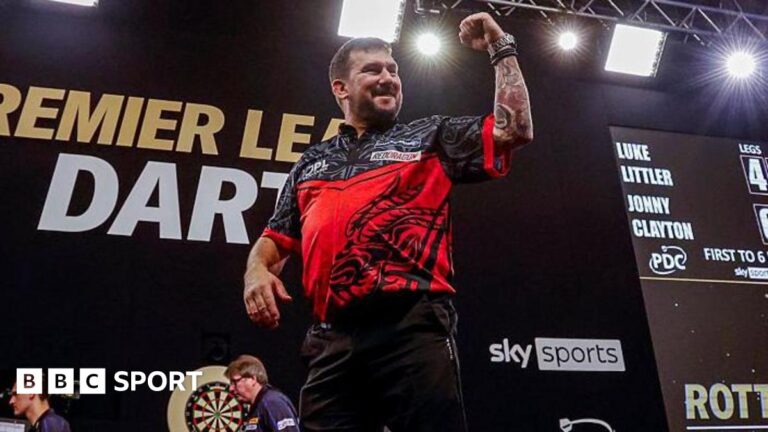 Jonny Clayton: The former plasterer lighting up the Premier League Jonny Clayton celebrates