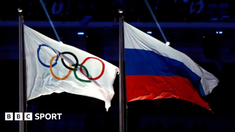 Russian Olympic Committee to pay athletes banned from Winter Olympics The flag of the International Olympic Committee and the flag of the Russia national flag