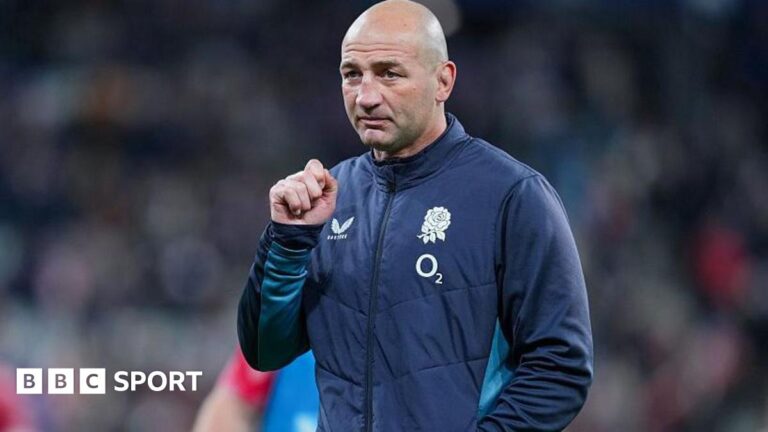 Steve Borthwick: RFU backs England boss but demands improvement Steve Borthwick, wearing a nany blue zip-up England jacket, looks into the distance, his right hand raised to shoulder level