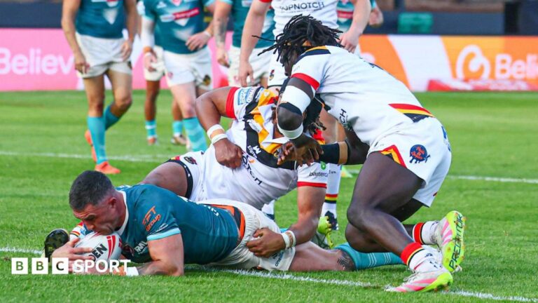 Super League: Bradford Bulls 10-40 St Helens – Saints grind out strong away win Curtis Sironen (left) has the ball down on the tryline for St Helens with two Bradford defenders on top of him