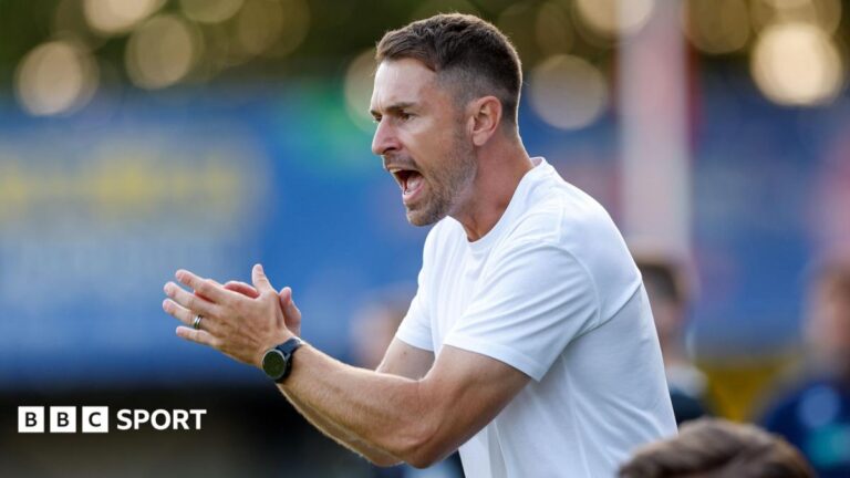 Aaron Ramsey: Oxford United boss ‘fully committed’ despite transfer embargo Aaron Ramsey encourages his players from the sidelines