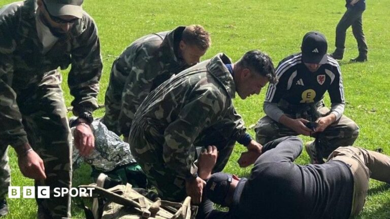 Bombs, blood, ambushes – why football coaches train with the army A group including Willy Caballero (left), Aaron Ramsey (second right) and Luke Williams (right) tend to a casualty during a military training exercise as part of the FAW's Uefa pro licence course
