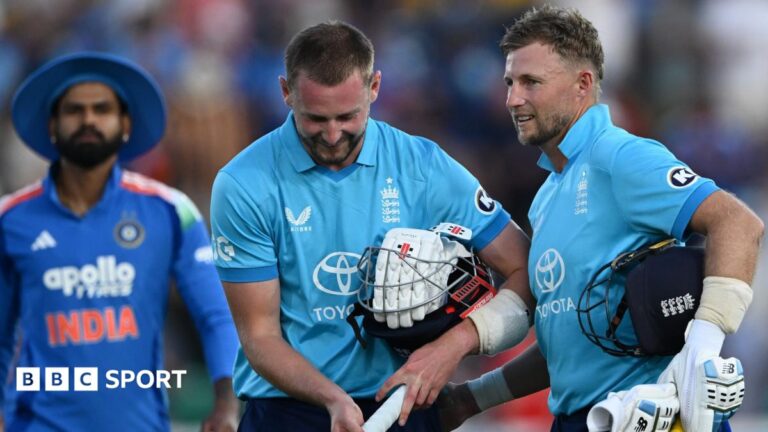 Joe Root, right, roars in the direction of Gus Atkinson as England seal victory over India