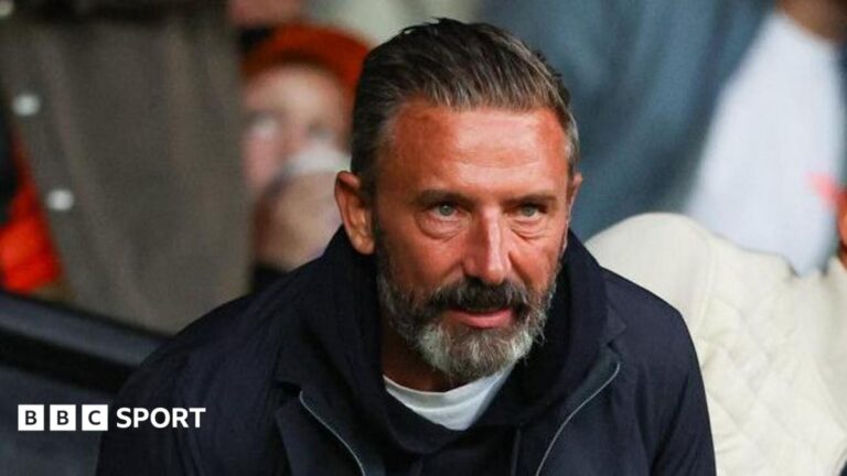 McInnes gets touchline ban for ‘disgusting’ Celtic penalty remark Jeff Bezos and Liverpool FC badge
