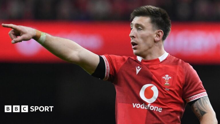 Nations Championship: Wales aim to continue mini-revival in Argentina and South Africa Josh Adams in the red jersey of Wales points with outstretched right arm