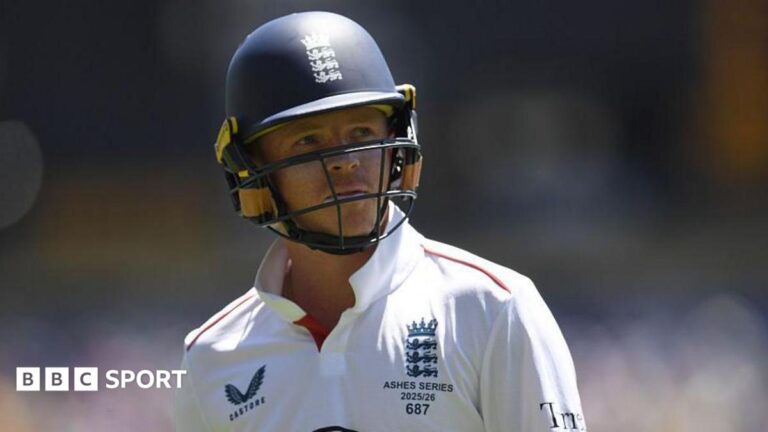 England recall Pope and Lawrence for Pakistan Tests Ollie Pope, wearing a blue helmet and white England shirt, looks to his left