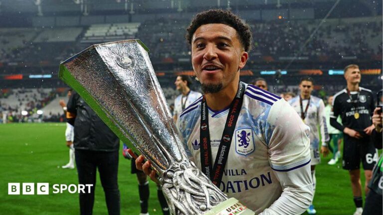 Jadon Sancho: Flixton FC say they are not signing winger after he trained there Jadon Sancho holds the Europa League trophy during the final celebrations after Aston Villa won the competition last season
