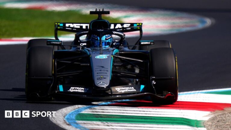 Italian Grand Prix: George Russell leads Charles Leclerc in Friday practice at Monza Mercedes' George Russell drives over a kerb during Italian Grand Prix first practice